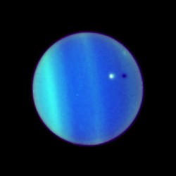 Ariel transits Uranus, HST photo